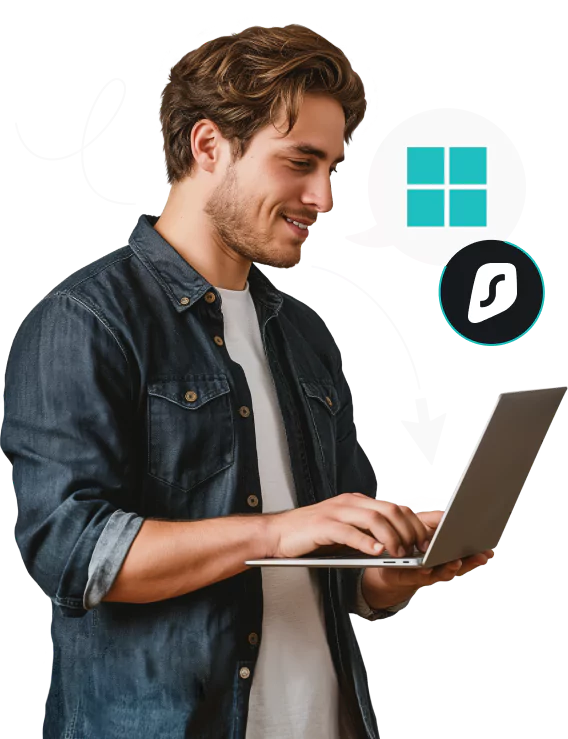 노트북을 들고 웃고 있는 남자, Windows 로고 말풍선 및 그 옆에 Surfshark 로고가 있습니다.